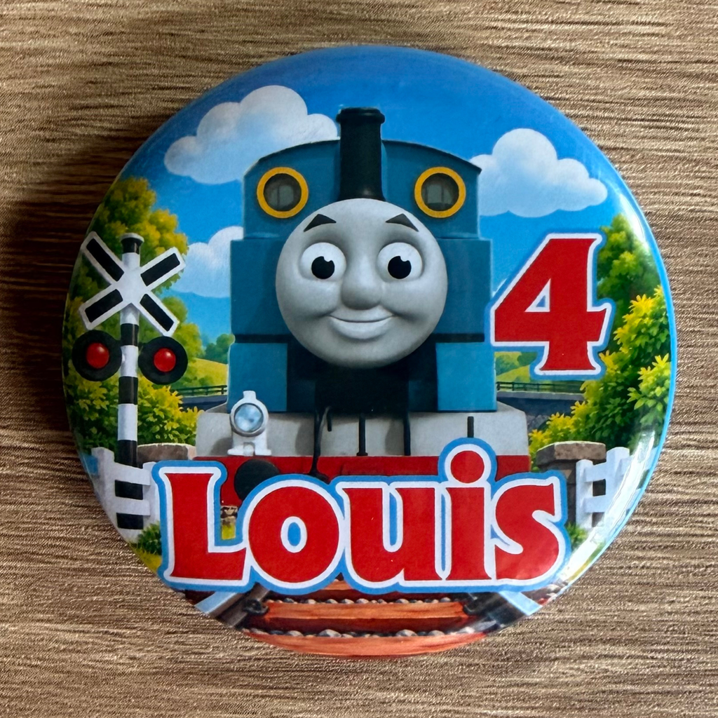 Thomas the Tank Engine personalised 58mm birthday badge with name and age, railway crossing and blue train