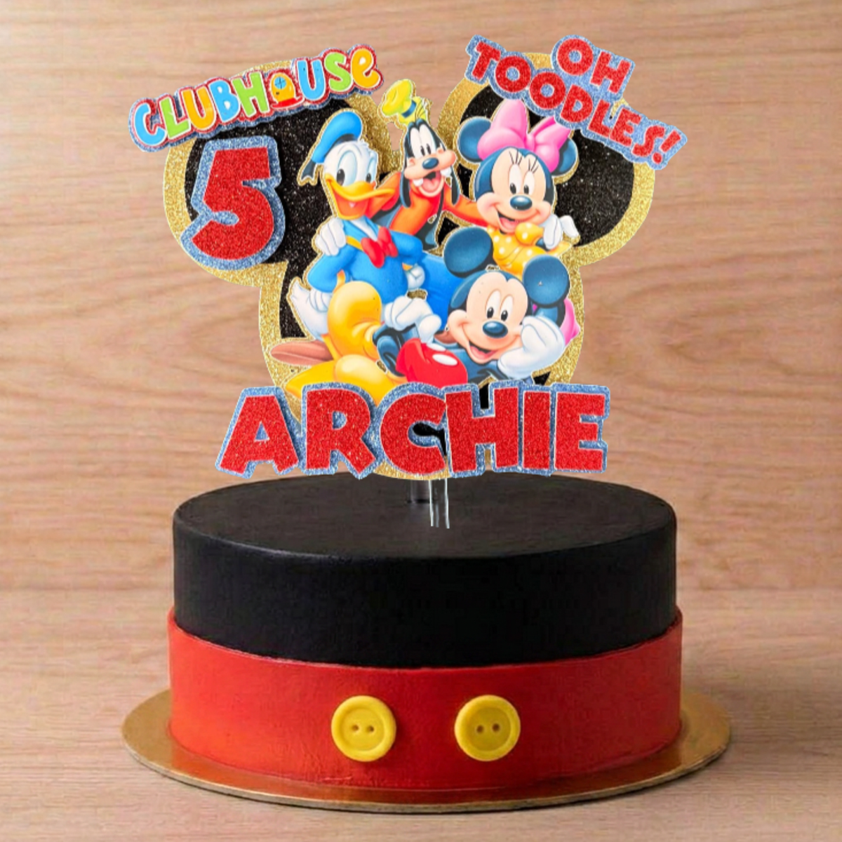 Personalised Mickey Mouse and friends cake topper displayed on a themed birthday cake